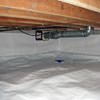 A heating duct extends along this sealed crawl space in Langford.