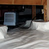An energy efficient crawl space dehumidifier installed in a sealed crawl space in Comox.