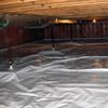 A sealed crawl space with support posts showing in Duncan.