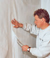 Courtenay, British Columbia installation in progress of a crawl space vapor barrier