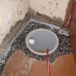 Installing a sump in a sump pump liner in a Victoria home
