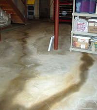 Flooding entering a basement through a floor crack in Ladysmith