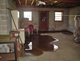 a flooded basement floor in a Black Creek home