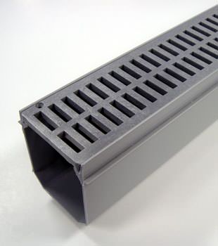 A closeup of our grated basement drainage pipe system, installed in North Sannich