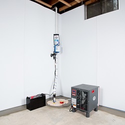 Sump pump system, dehumidifier, and basement wall panels installed during a sump pump installation in Parksville
