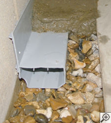 A no-clog basement french drain system installed in Port Alberni