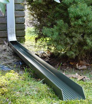 Gutter downspout extension installed in Black Creek