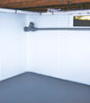 Victoria, BC wet basement wall covering that tucks into a perimeter drainage system