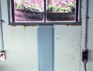 Repaired waterproofed basement window leak in Campbell River