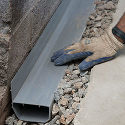 installing a drain tile system in a Nanoose Bay home